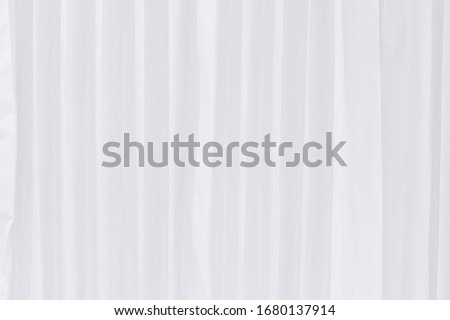 The texture of white curtains with stylish straight lines, abstract art background Royalty-Free Stock Photo #1680137914