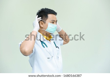 A doctor wearing a medical mask. scientist in biological protective Epidemic virus outbreak concept. COVID-19