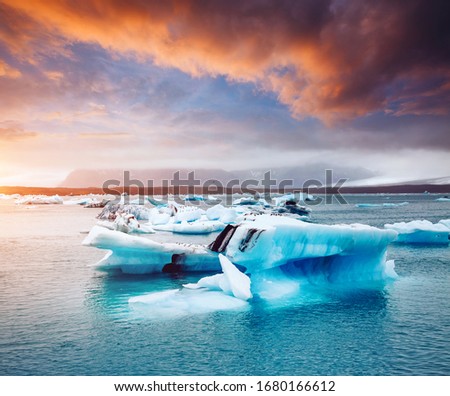 Exotic scene of Jokulsarlon lagoon, large pieces of iceberg drifts in the ocean. Location famous place Vatnajokull national park, island Iceland, Europe. Climate change. Explore the beauty of world.