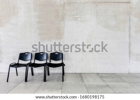 Photo of chairs in corridor at school