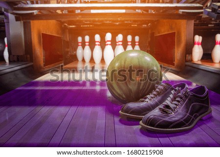 bowling alley. balls, pins and shoes. 