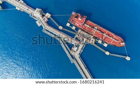 aerial top view oil tankers park at oil port.