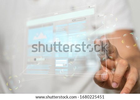 A person presenting the virtual projection of a website