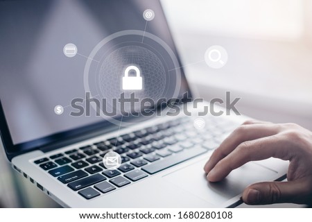 Man - hand using laptop. security network of connected devices and personal data security. anonymous                