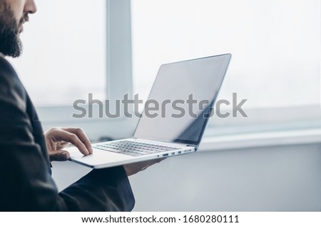man - hand using laptop. security network of connected devices and personal data security. anonymous                 