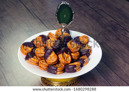 Chocolate pretzel snack with ornament stock photo