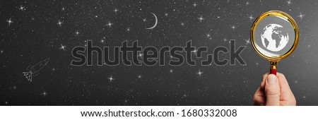 Painting on a gray background. view of space with earth, moon, stars and rocket.
