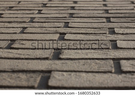 Imitation of grey stucco brickwork, civil and industrial construction.