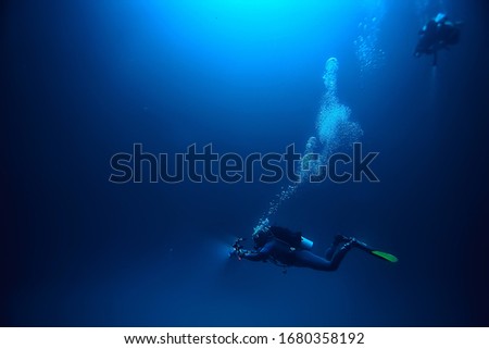 cenote angelita, mexico, cave diving, extreme adventure underwater, landscape under water fog Royalty-Free Stock Photo #1680358192