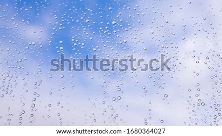 
High resolution water drops on window glass