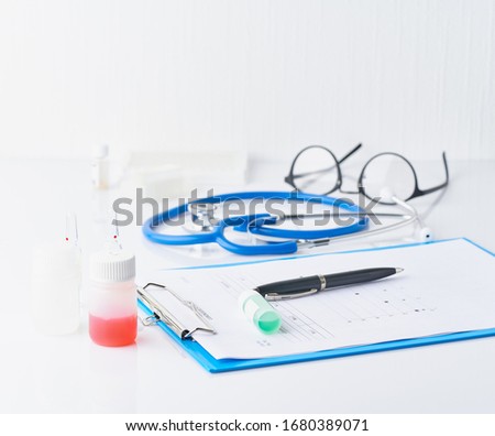 Pandemic COVID-19, Coronavirus. Nobody. Medical supplies, tests, bottles, microscope, clipboard with notes on table. No one is there. Concept of laboratory , development of new drugs and vaccines