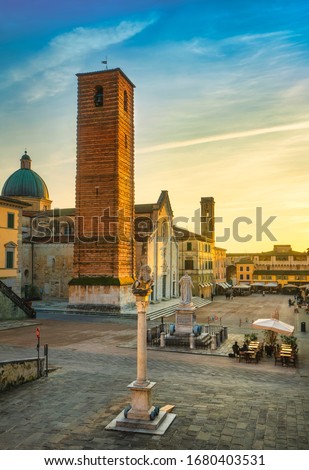 Pietrasanta old town view at sunset, San Martino cathedral and torre civica. Versilia Lucca Tuscany Italy Europe Royalty-Free Stock Photo #1680403531
