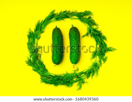 two cucumbers and dill in a circle as a symbol of the Roman numeral two