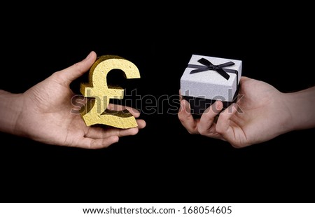 people exchanging money for gift on black background