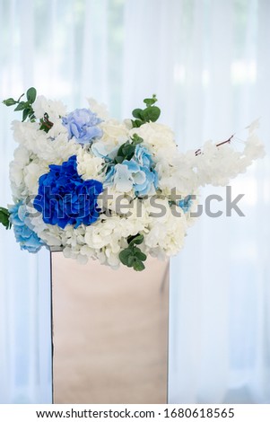 Decoration of flowers for a wedding ceremony in the restaurant stock photo