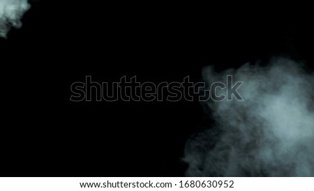 Real Smoke on black dark background photo. Clouds overlay. Mist, fog, haze.