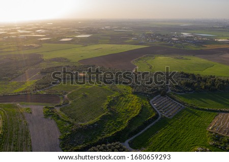 Aerial panoramic spring view of the Tel Gezer archaeological site, Tel Aviv, Karmei Yosef village, and the valley of Ayalon in the foothills of the Judaean Mountains at the border of the Shfela region