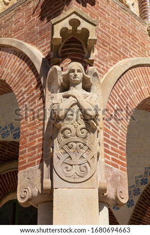 Elements of architectural decorations of buildings, sculptures and statues, gypsum stucco and plaster ornaments. On the streets in Catalonia, public places.