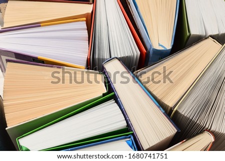 Top view image of colorful books, education background   Royalty-Free Stock Photo #1680741751