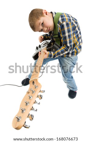 Boy playing the guitar