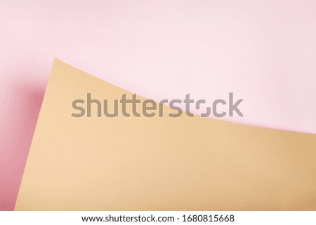 Pink and brown abstract paper background from a curved sheet. Blank for website, advertising, presentation.