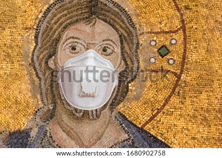 Medical mask, protection against coronavirus and other viruses. the face of Jesus with nimbus