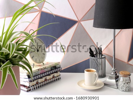 Home office place with stationery, cup of coffee on pastel color background. Home office working station concept Royalty-Free Stock Photo #1680930901