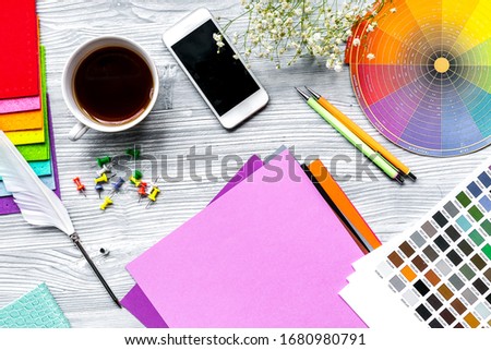 profession concept with designer tools on work desk background top view