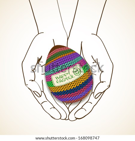 Easter greeting card with sketch human hands holding volume striped knitted egg