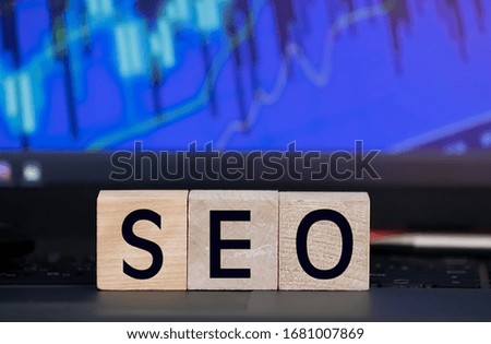 close up of wooden blocks making SEO word. Search engine optimization
