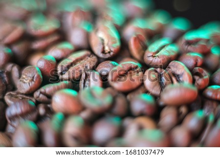 Coffee beans close- up. Beautiful blur. Natural coffee background. The artistic side. Delicious coffee. Coffee still life.