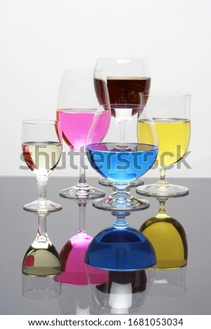 colorful cocktail drinks in glass cup