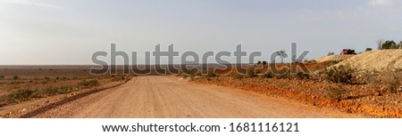 A dirt road in the opal mining town of White Cliffs, NSW, Australia