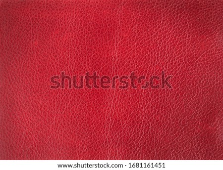 Genuine leather texture maroon color. Leather surface. Close up. Copy space.