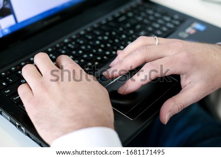 A person works at a computer