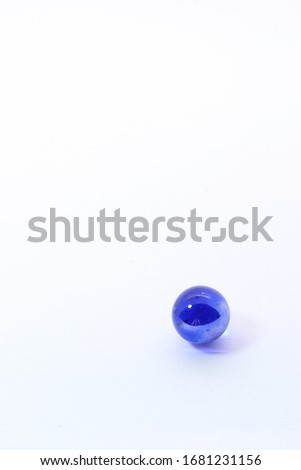 multi colored marbles, glass marbles on white background