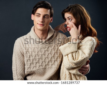 Young people warm clothes sweater married couple
