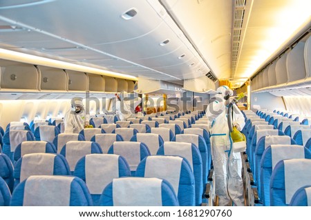 Covid-19 disease virus prevention. Airlines interior cabin deep cleaning for coronavirus. Royalty-Free Stock Photo #1681290760