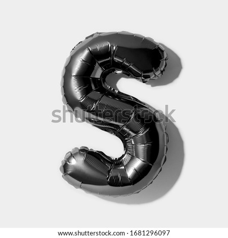 Letter S, Black foil balloon alphabet isolated on a white background with Clipping Path