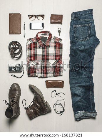 Still life of casual man./  Overhead of essentials modern man.  Royalty-Free Stock Photo #168137321