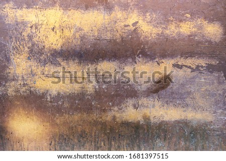 Rome, Italy - Texture, pattern, background. Metal slab, travertine used in construction and architecture for walls and cladding. Material worn over time, with scratches, stains, rust and oxidation.