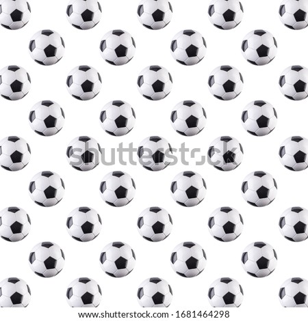 Seamless pattern of balls. Black and white soccer balls flying in the air, isolated on white background. Minimalistic concept of sports