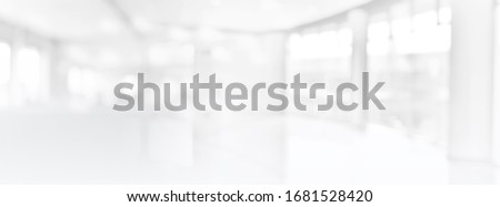 Wide Blurred Empty Abstract Building Pathway Background From Perspective Building Hallway for banner background, way go to success concept Royalty-Free Stock Photo #1681528420