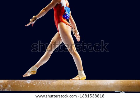 feet woman gymnast athlete in balance beam exercise