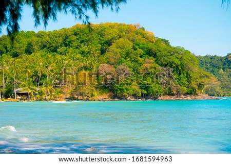Beautiful tropical beach as summer seascape with mountains and blue sky for travel in holiday relax time,