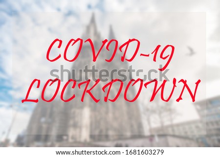 Covid-19 Lockdown word in red color with blur famous landmark background which shot by contributor indicating the Coronavirus pandemic outbreak