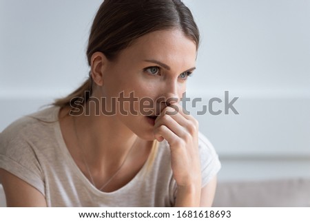 Head shot close up serious upset thoughtful young woman looking in distance, thinking about problems, pensive unhappy female making difficult decision, lost in thoughts, consider life troubles Royalty-Free Stock Photo #1681618693