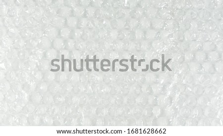 Bubble wrap texture on white background.