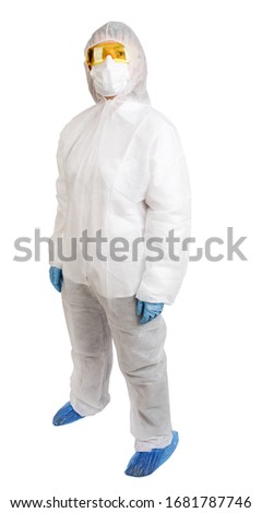 Doctor in disposable anti-epidemic suit wearing a mask and glasses isolated on white background