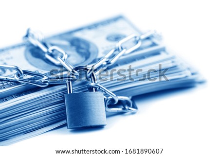 Business safety or financial protection or restriction access. Heap of money in chain with padlock isolated on white Royalty-Free Stock Photo #1681890607